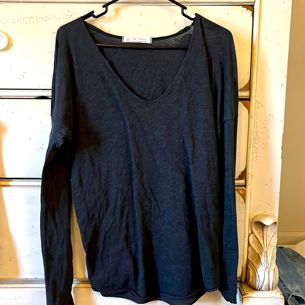 Oversized Free People long sleeve cotton top . Fits like a large